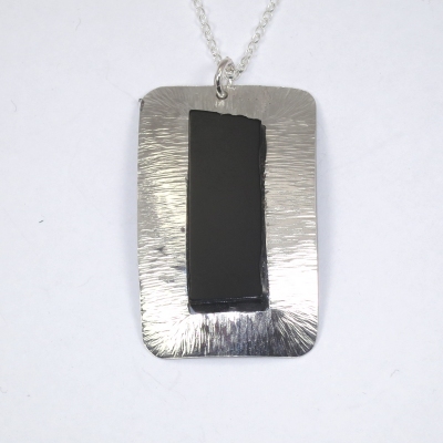 Recatngular silver pendant with jet insert